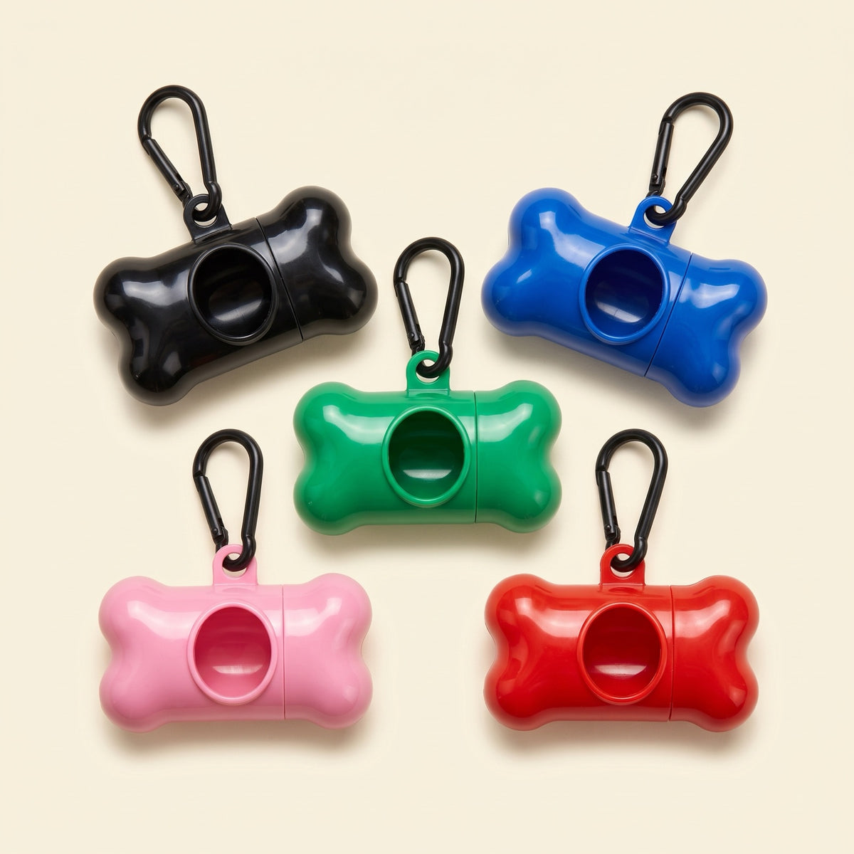 Dispenser per sacchetti a forma di osso in cinque colori
